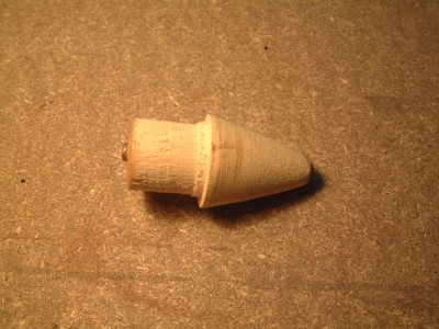 Partie arrière, tirée comme l'avant du rondin de bois